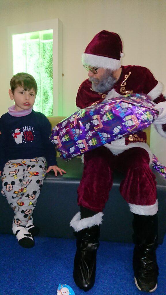Santa giving a present
