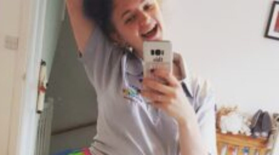 Image of Heather Watson taking a photo of herself in the mirror