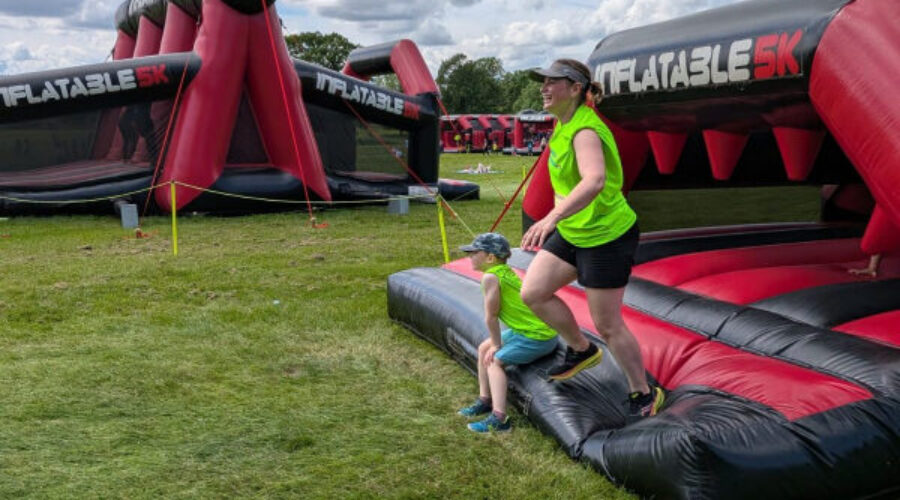 Bouncing for a Good Cause: Anna and Reuben Take on the Inflatable 2.5k!